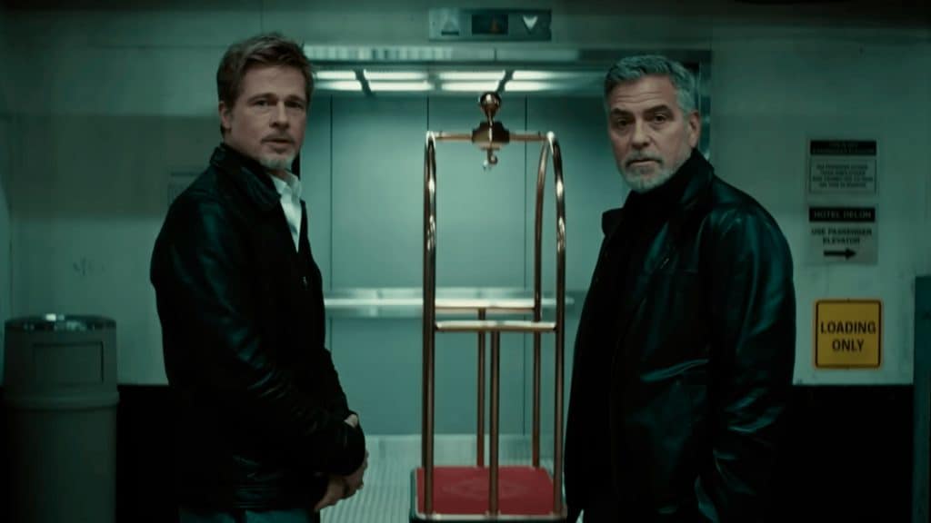 Cena do filme Lobos com Brad Pitt e George Clooney