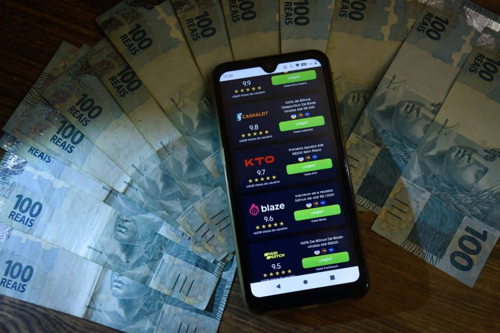 Celular com apps de apostas, apostar em bet pode ser um vícios