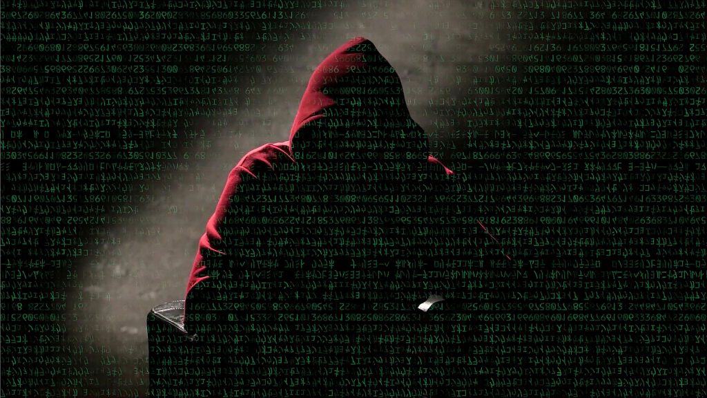 Ilustração de hacker usando moletom vermelho e sobreposto por linhas de programação com letrinhas verdes