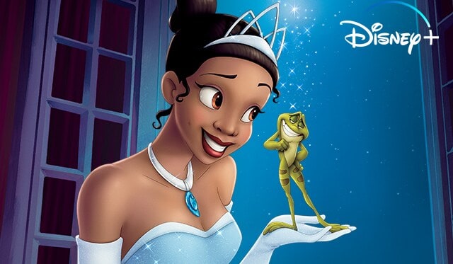 Uma menina negra segurando um sapo