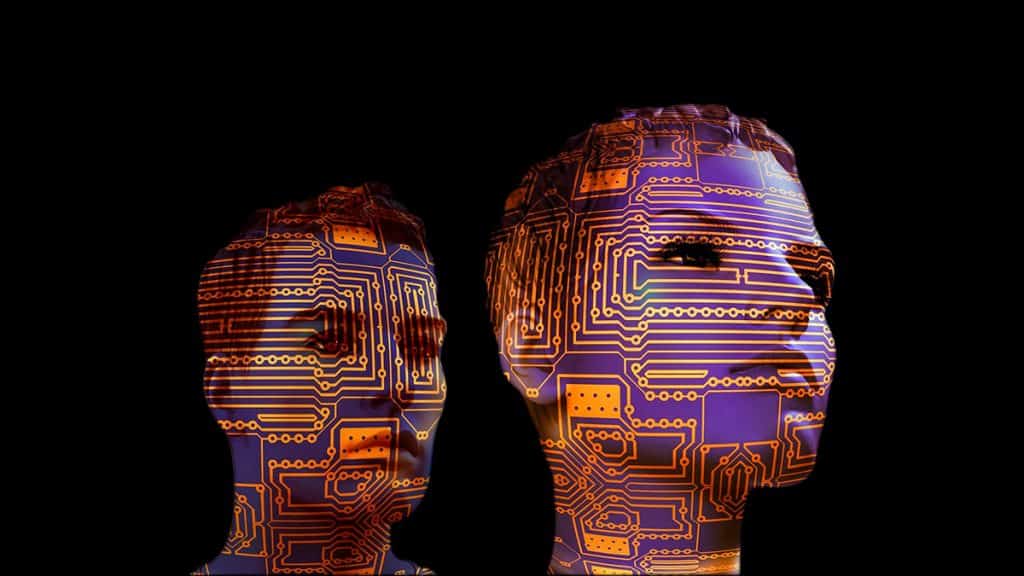Montagem com cabeças de bonecos sobrepostos por linhas de chip