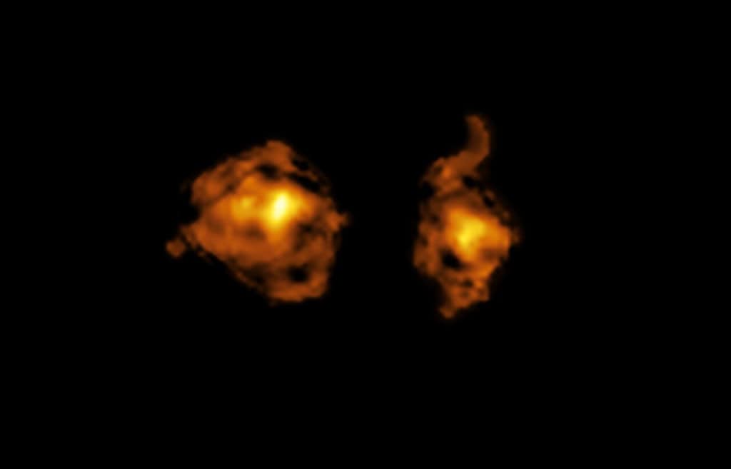 Imagem do ALMA que mostra o conteúdo de gás molecular de duas galáxias envolvidas em uma colisão cósmica. A da direita abriga um quasar liberando radiação intensa diretamente na outra galáxia.