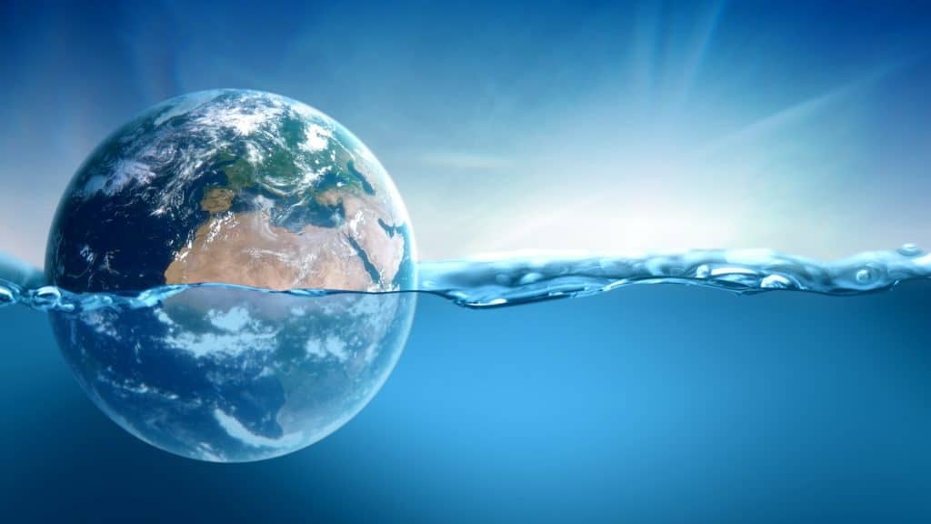 Planet Earth Globe Sinking in Rising Sea Level of Blue Ocean in Climate Change