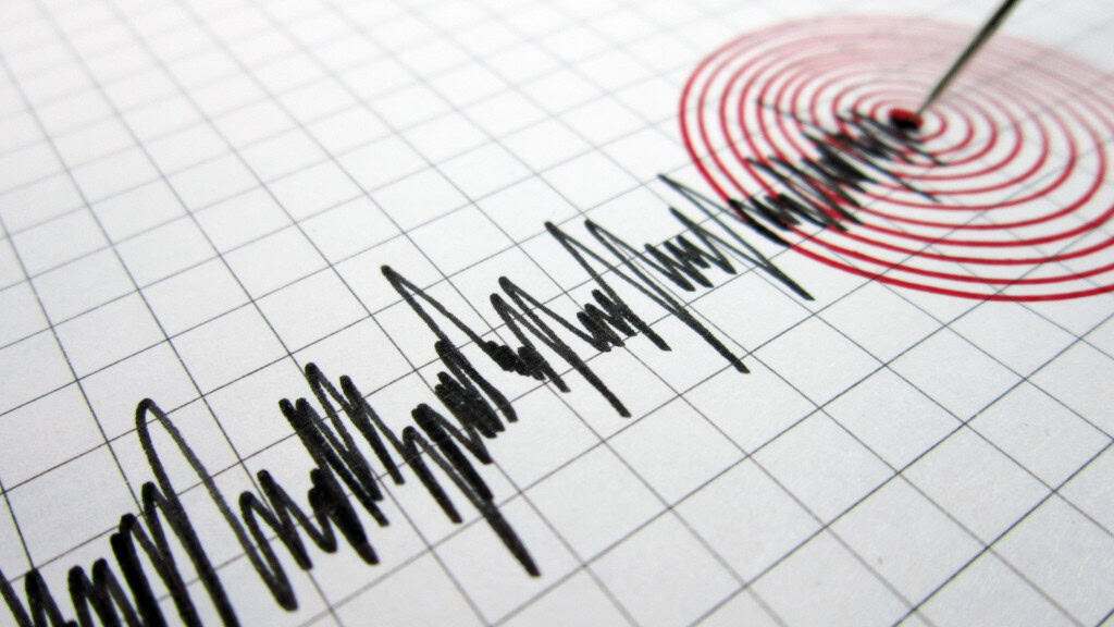 Ilustração de medições de terremoto feitas por agulha de sismógrafo
