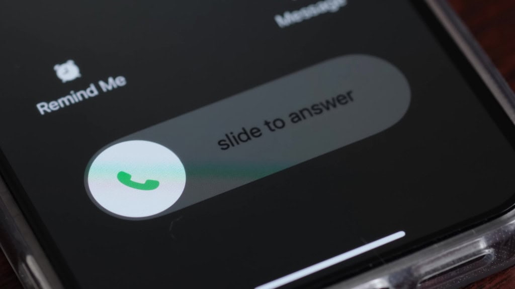 Botão de atender chamada em um celular